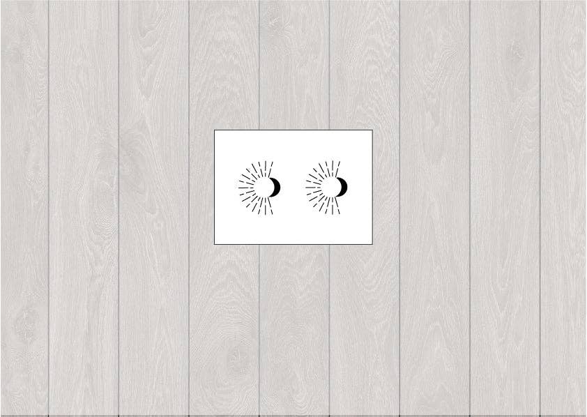 Temporary tattoo of a moon and a sun with rays