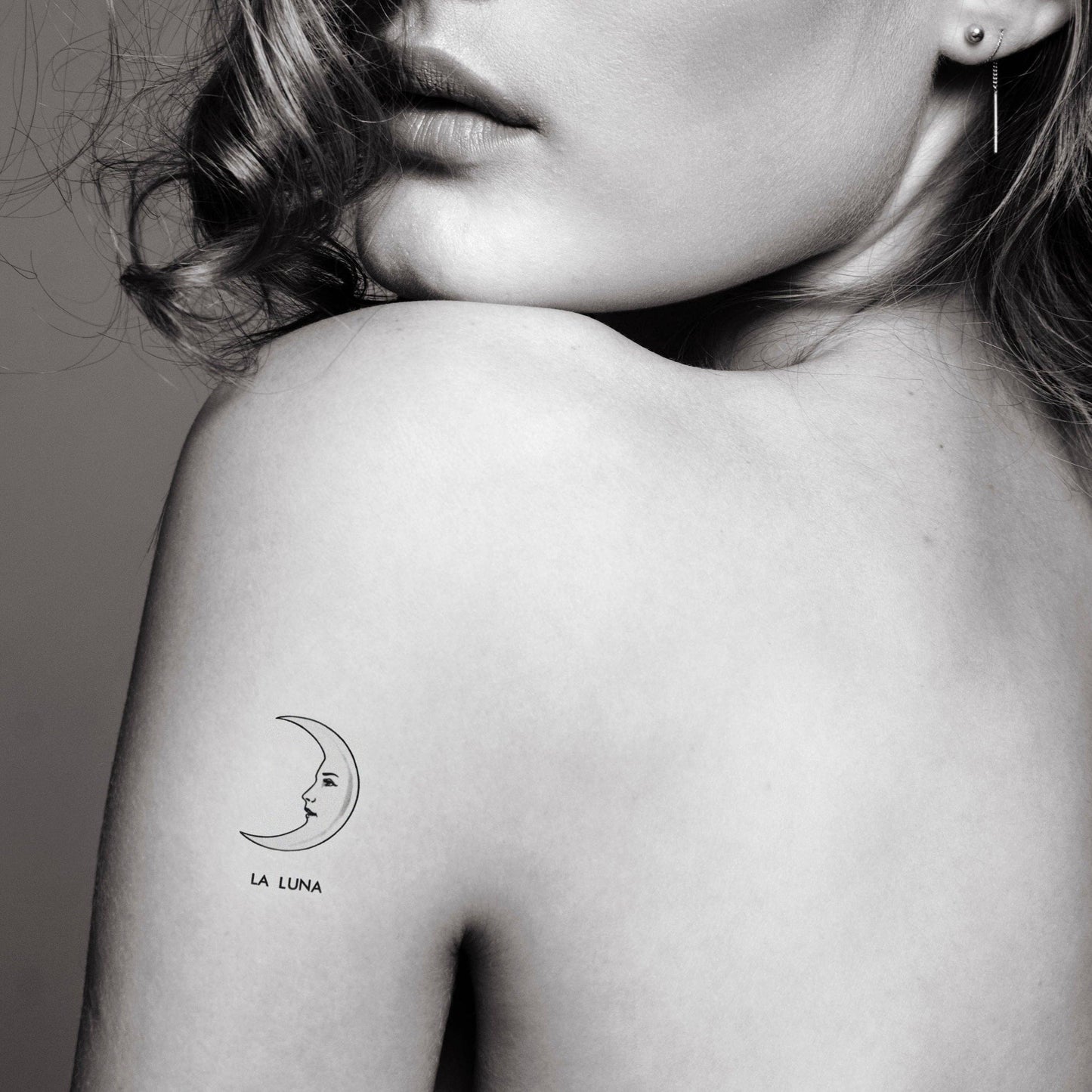 Vintage moon temporary tattoo inspired by the card of