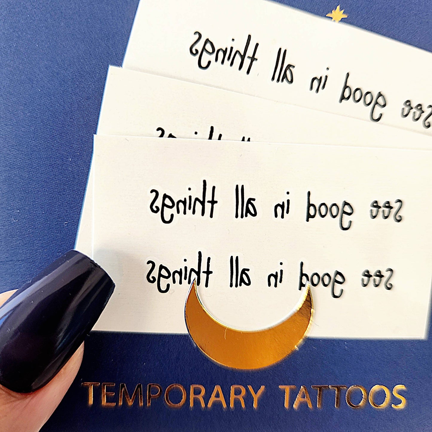 Temporary tattoo of the phrase "see good in all things"